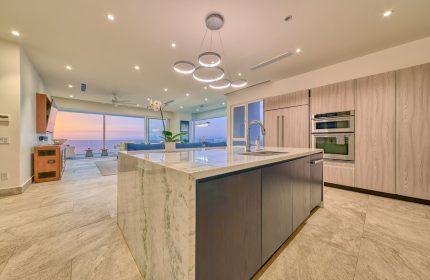 Maxwell Residences at Indah: Gay-friendly hotel kitchen island with ocean view. Luxury condo interior for gay travel.