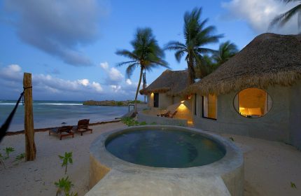 Gay-friendly Maya Tulum By G Hotels: Beachfront bungalows with thatched roofs, private pool, and ocean views. Perfect for gay travel in Tulum.