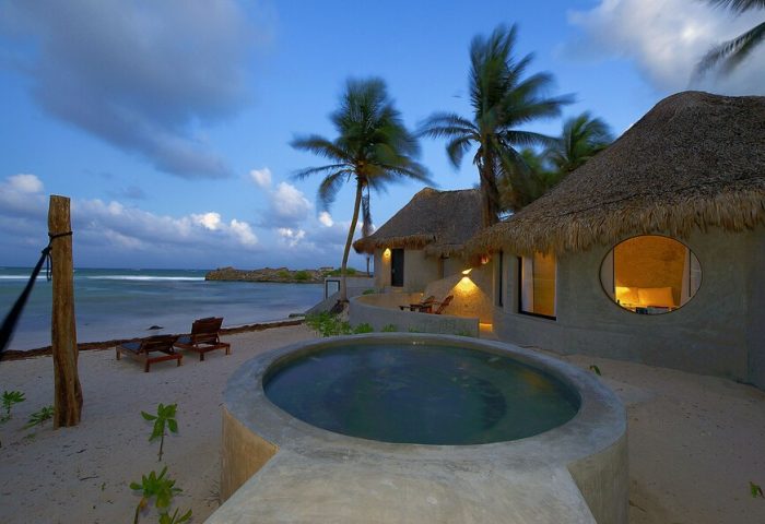 Gay-friendly Maya Tulum By G Hotels: Beachfront bungalows with thatched roofs, private pool, and ocean views. Perfect for gay travel in Tulum.