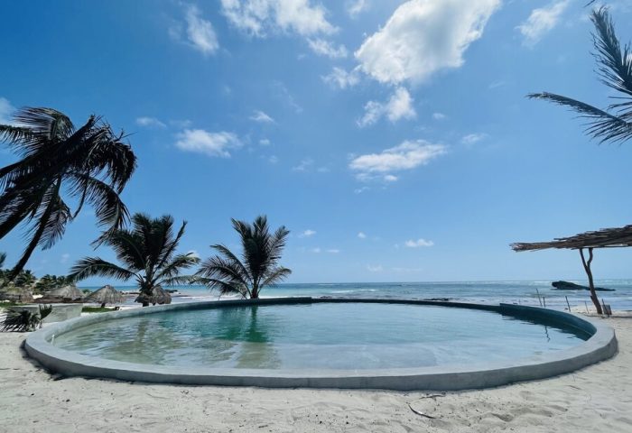 Maya Tulum By G Hotels: Round pool at this gay-friendly hotel. Beachfront view with palm trees. Ideal for gay men's travel.