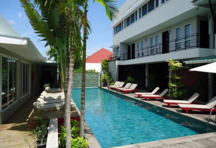 Pool at Gay-Friendly Men's Resort & Spa. Relaxing vacation spot for gay men. Tropical getaway at this gay hotel.