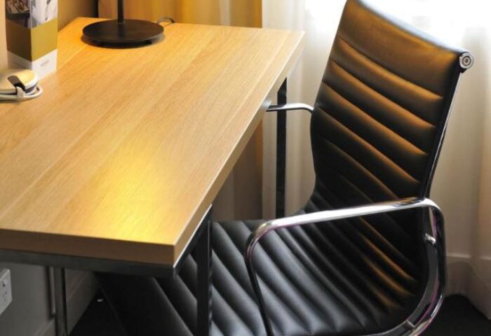 Desk and chair at Mercure Melbourne Therry Street, a gay-friendly hotel. Ideal for work or relaxing during your stay in Melbourne.