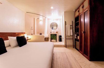 Mezzanine a Colibri Boutique Hotel-Adults Only room. Gay-friendly hotel with bed, bathroom, and closet. Ideal for gay travel.