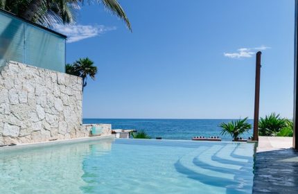 Pool view at gay-friendly Mi Amor a Colibri Boutique Hotel-Adults Only. Oceanfront luxury for gay travelers. Tropical paradise.