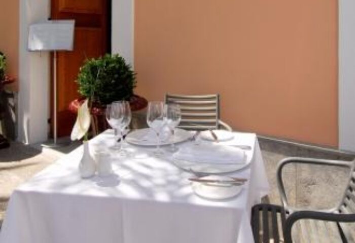 Table setting at Mirador de Dalt Vila-Relais & Chateaux, a gay-friendly hotel. Fine dining experience for gay travelers. Ibiza luxury.