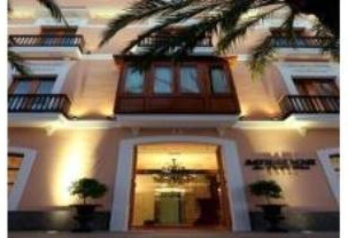 Mirador de Dalt Vila, a gay-friendly Relais & Chateaux hotel. Facade view with balconies. Upscale travel for gay men in Ibiza, Spain.
