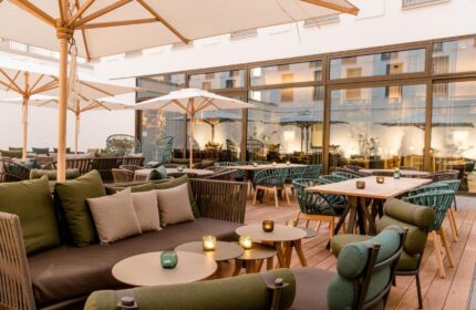 Motel One Koln-Neumarkt's stylish outdoor patio. This gay-friendly hotel in Cologne, Germany, offers a relaxed atmosphere for travelers.