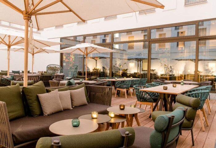 Motel One Koln-Neumarkt's stylish outdoor patio. This gay-friendly hotel in Cologne, Germany, offers a relaxed atmosphere for travelers.