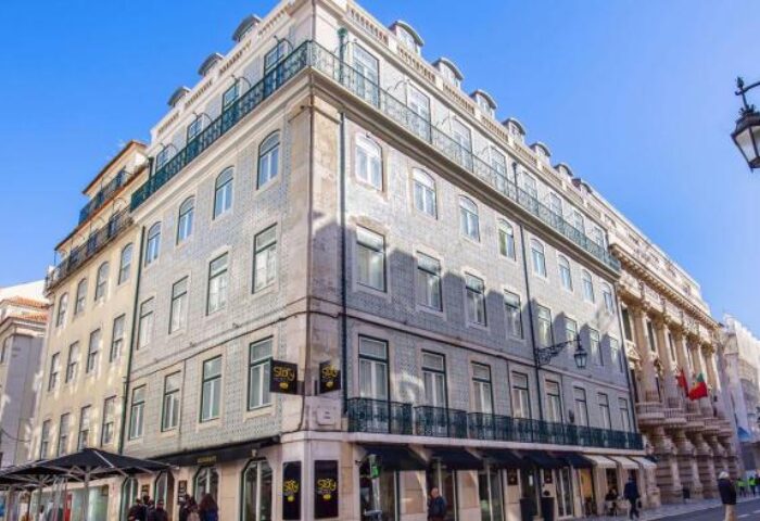 My Story Hotel Ouro, a gay-friendly hotel in Lisbon. Building exterior with traditional Portuguese tiles and balconies. A great choice for gay travelers.
