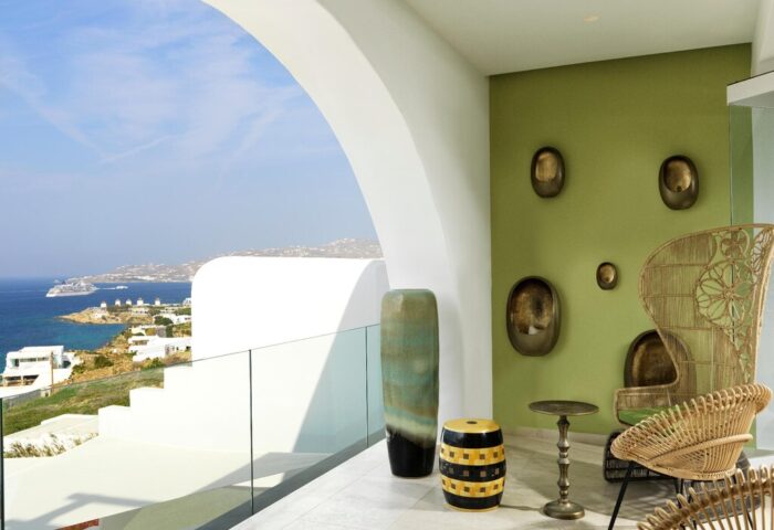 Myconian Korali Relais & Chateaux gay-friendly hotel room view. Stylish decor, sea view. Ideal for gay travel in Mykonos.