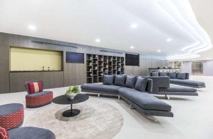 NH Collection Mexico City Reforma's stylish lounge area. Gay-friendly hotel with modern decor, comfortable seating, and a welcoming atmosphere.