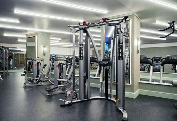 Gym at NoMad Las Vegas, a gay-friendly hotel. Hoist cable machine and Cybex treadmills for a workout. Fitness center for gay travelers.