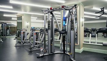 Gym at NoMad Las Vegas, a gay-friendly hotel. Hoist cable machine and Cybex treadmills for a workout. Fitness center for gay travelers.