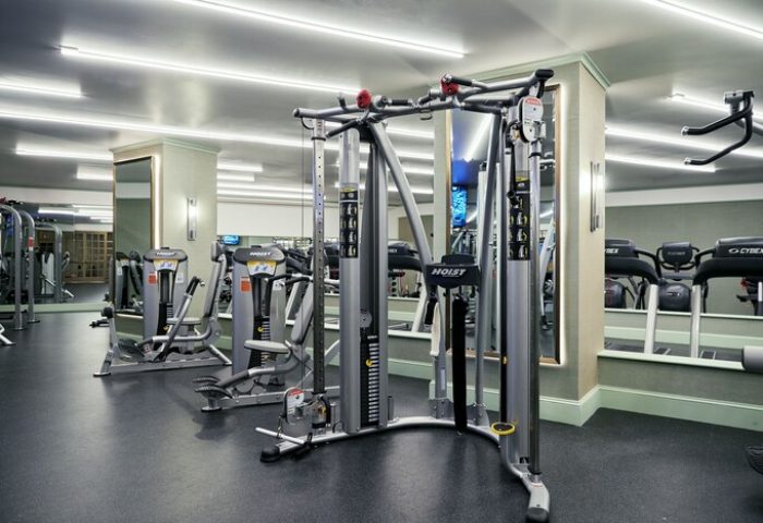 Gym at NoMad Las Vegas, a gay-friendly hotel. Hoist cable machine and Cybex treadmills for a workout. Fitness center for gay travelers.