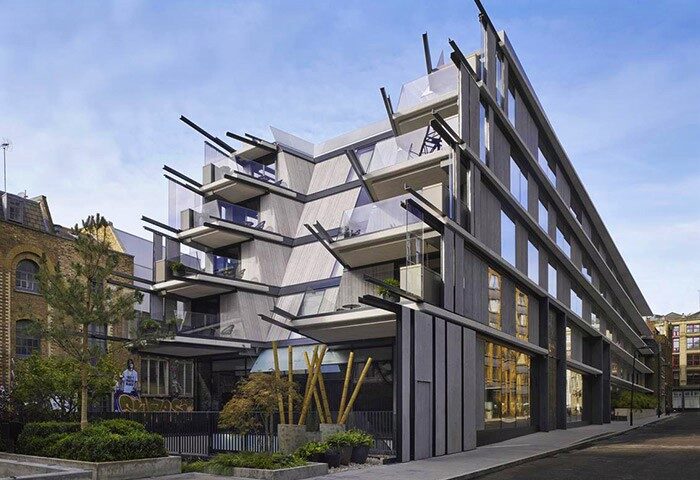 Nobu Hotel Shoreditch exterior. Modern architecture, balconies, and street view. Gay-friendly, pet-friendly hotel in Shoreditch, London.