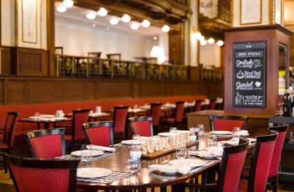 Novotel Budapest Centrum Hotel restaurant. Social table setting. Gay-friendly hotel with house specials like goulash and stuffed cabbage.