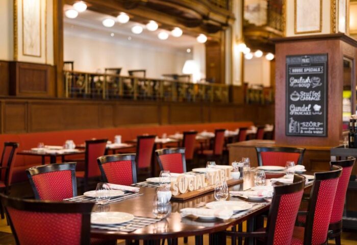 Novotel Budapest Centrum Hotel restaurant. Social table setting. Gay-friendly hotel with house specials like goulash and stuffed cabbage.