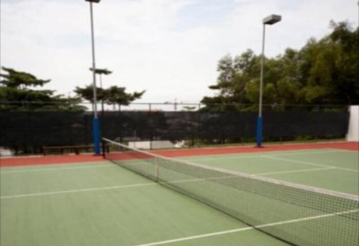Tennis court at ONE15 Marina Sentosa Cove, Singapore. A gay-friendly hotel with sports facilities for active travelers.