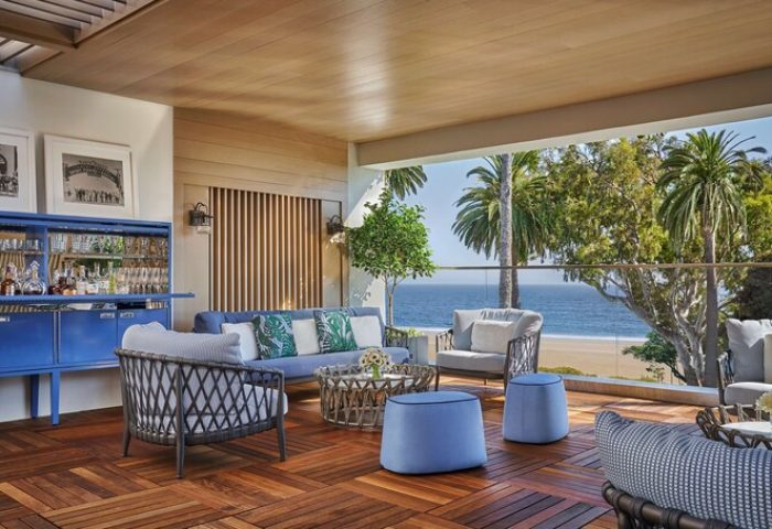 Oceana Santa Monica LXR Hotels & Resorts patio. Ocean view, bar, & seating. Gay-friendly hotel. Santa Monica travel for gay men.