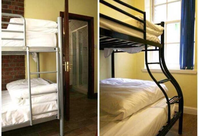 Oliver St. John Gogarty's Hostel room: bunk beds in a gay-friendly hotel. Budget travel for gay men. Hostel room with bathroom.