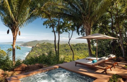One&Only Mandarina gay-friendly hotel view. Ocean view from luxury suite's private plunge pool and lounge chairs. Tropical gay travel.