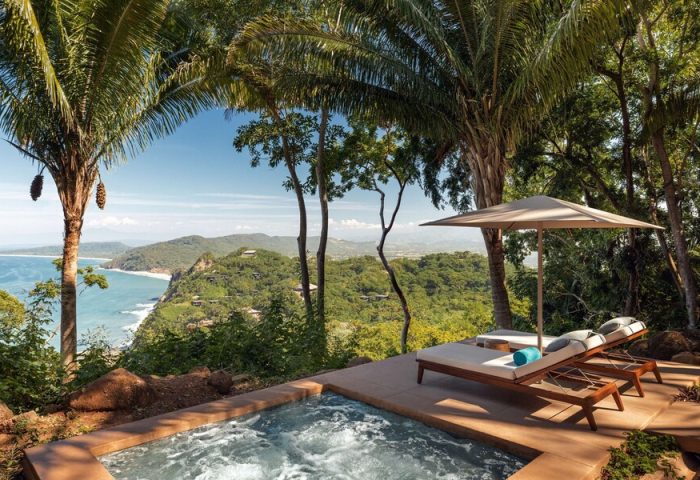 One&Only Mandarina gay-friendly hotel view. Ocean view from luxury suite's private plunge pool and lounge chairs. Tropical gay travel.