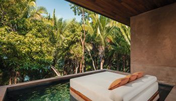 One&Only Mandarina gay-friendly hotel suite. Daybed by a plunge pool overlooking lush jungle. Luxury gay travel in Riviera Nayarit, Mexico.
