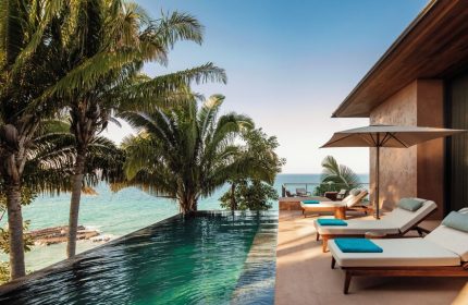 One&Only Mandarina gay-friendly hotel. Infinity pool, ocean view, lounge chairs. Tropical luxury for gay travel. Gay resort vacation.