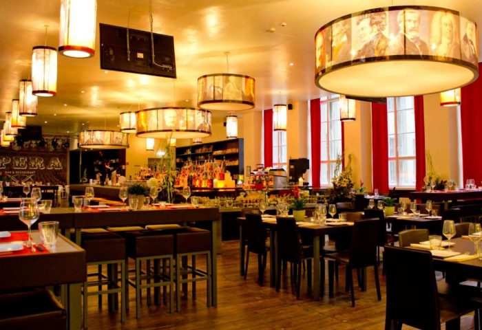 PLUS Berlin Hotel & Hostel's restaurant. Gay-friendly hotel with modern decor, stylish lighting, and a well-stocked bar. Ideal for gay travel.