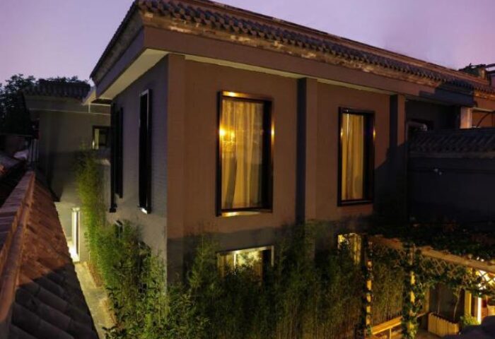 PUREMIND Hutong Courtyard Hotel exterior. Gay-friendly hotel in Beijing, China, with traditional architecture and modern amenities.