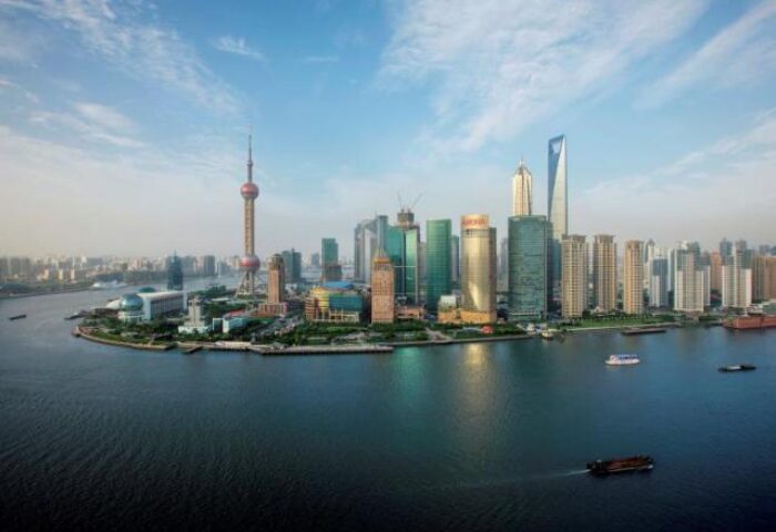 Shanghai skyline view from gay-friendly Park Hyatt Shanghai. Features the Oriental Pearl Tower and Huangpu River. A great hotel for gay travelers.