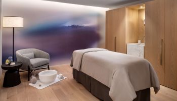 Gay-friendly Park Hyatt Toronto: Spa room with massage table, chair, and foot bath. Luxurious amenities at this Toronto hotel.