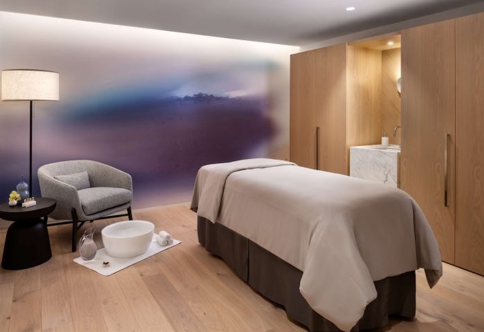 Gay-friendly Park Hyatt Toronto: Spa room with massage table, chair, and foot bath. Luxurious amenities at this Toronto hotel.