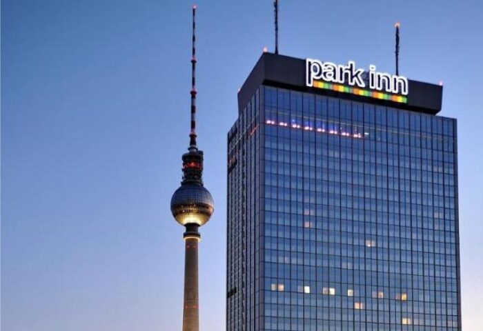 Park Inn by Radisson Berlin Alexanderplatz, a gay-friendly hotel, with the Berlin TV Tower in the background.