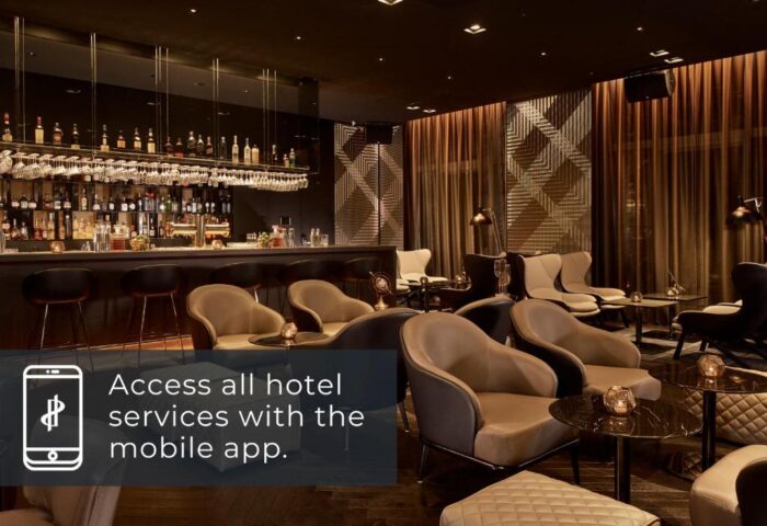 Gay-Friendly Park Plaza Victoria Amsterdam Hotel bar area. Stylish seating, cocktails, and a welcoming vibe for LGBTQ+ travelers.