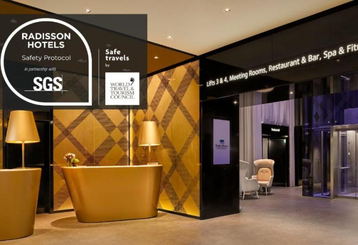 Park Plaza Victoria Amsterdam Hotel lobby. Gay-friendly hotel with Radisson safety protocol. Modern design, restaurant, bar, spa & fitness.