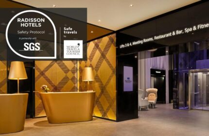 Park Plaza Victoria Amsterdam Hotel lobby. Gay-friendly hotel with Radisson safety protocol. Modern design, restaurant, bar, spa & fitness.