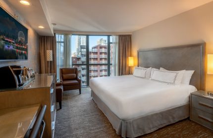Parker Hotel Vancouver room. Gay-friendly hotel with city view, king bed, desk, & TV. Ideal for gay men travelers seeking comfort & style.