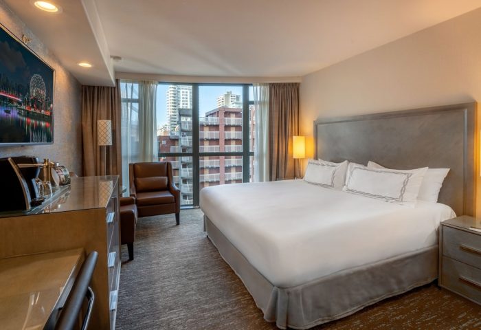 Parker Hotel Vancouver room. Gay-friendly hotel with city view, king bed, desk, & TV. Ideal for gay men travelers seeking comfort & style.