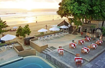 Gay-Friendly Pelangi Bali Hotel & Spa view. Beachfront dining, pool, & lounge chairs. A perfect Bali getaway for gay travelers.