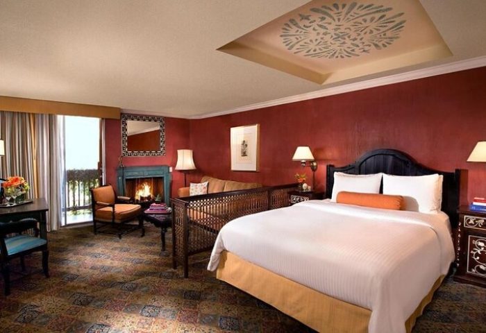 Petit Ermitage Hotel, Adults Only, gay-friendly room. Fireplace, king bed, and balcony. Upscale gay hotel for discerning travelers.