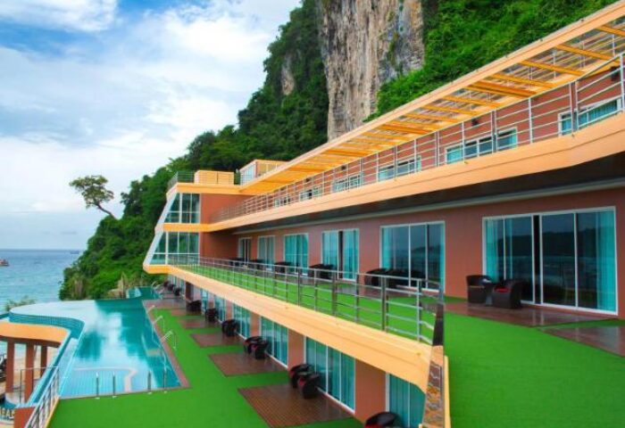 Phi Phi Cliff Beach Resort view. Gay-friendly hotel with pool, rooms, and cliffside setting. Ideal for gay men's travel in Thailand.