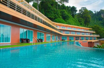 Phi Phi Cliff Beach Resort's pool. Gay-friendly hotel with cliffside views and a large pool. Perfect for gay men's travel in Thailand.