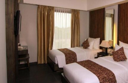 Ping Hotel Seminyak room with two beds. Gay-friendly hotel with modern design. Comfortable stay for gay travelers in Seminyak, Bali.