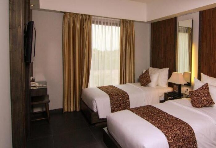 Ping Hotel Seminyak room with two beds. Gay-friendly hotel with modern design. Comfortable stay for gay travelers in Seminyak, Bali.