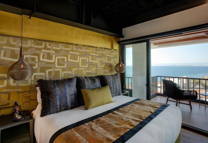 Pinnacle Resorts 179 adults-only, gay-friendly hotel. Room with balcony overlooking the ocean. Gay travel in Puerto Vallarta.