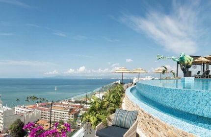 Pinnacle Resorts 179 Adults Only, gay-friendly hotel. Infinity pool overlooking Puerto Vallarta, ocean view. Luxury travel for gay men.