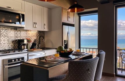 Pinnacle Resorts 179 adults-only gay-friendly hotel kitchen. Ocean view from balcony. Modern appliances, stylish design. Travel advice.