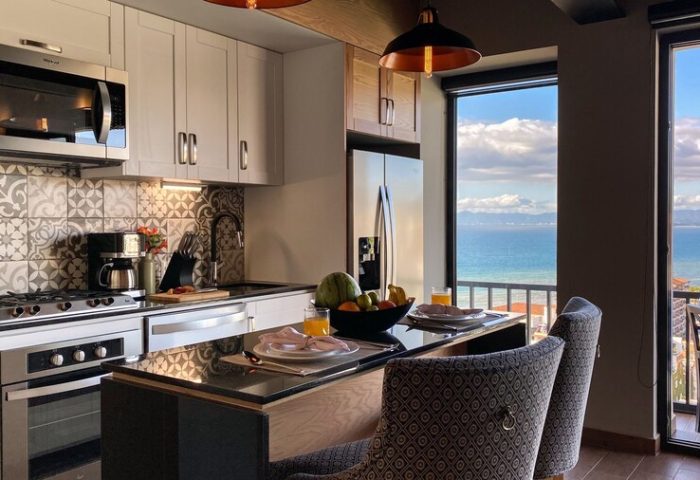 Pinnacle Resorts 179 adults-only gay-friendly hotel kitchen. Ocean view from balcony. Modern appliances, stylish design. Travel advice.
