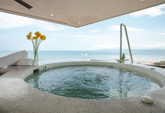 Pinnacle Resorts 180 gay-friendly hotel. Hot tub with ocean view. Luxury travel for gay men. Puerto Vallarta vacation. Relaxing getaway.